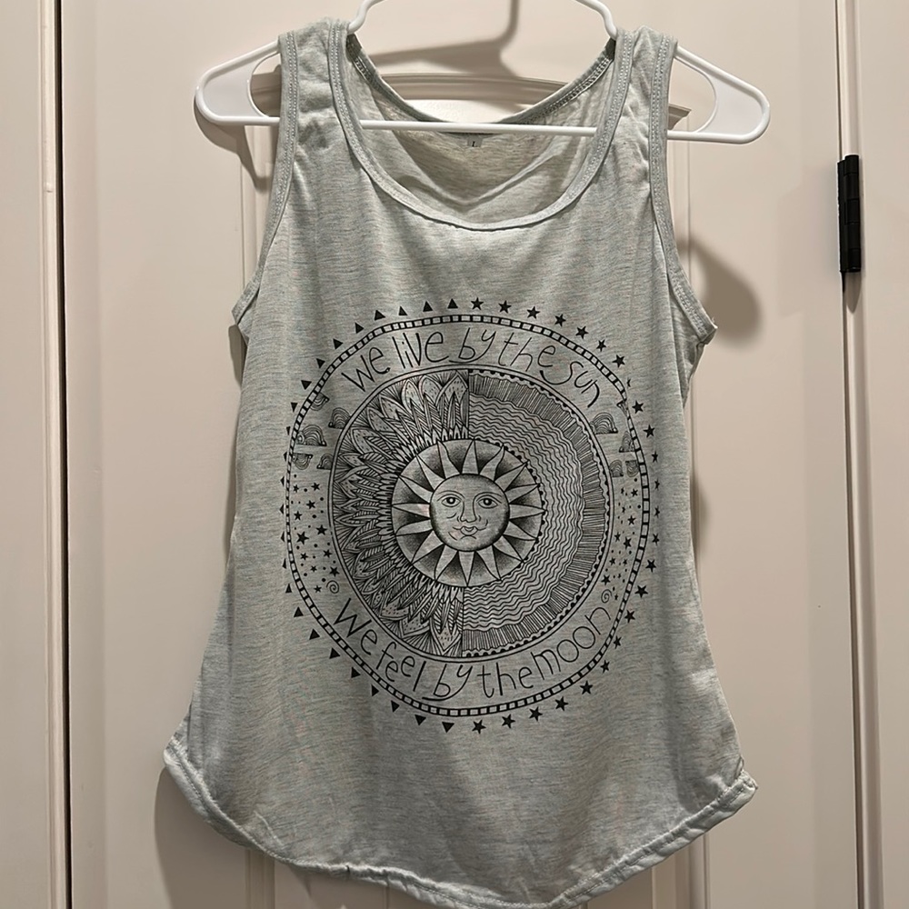Amazon tank, sizeL but fits like a medium, brand new, never worn